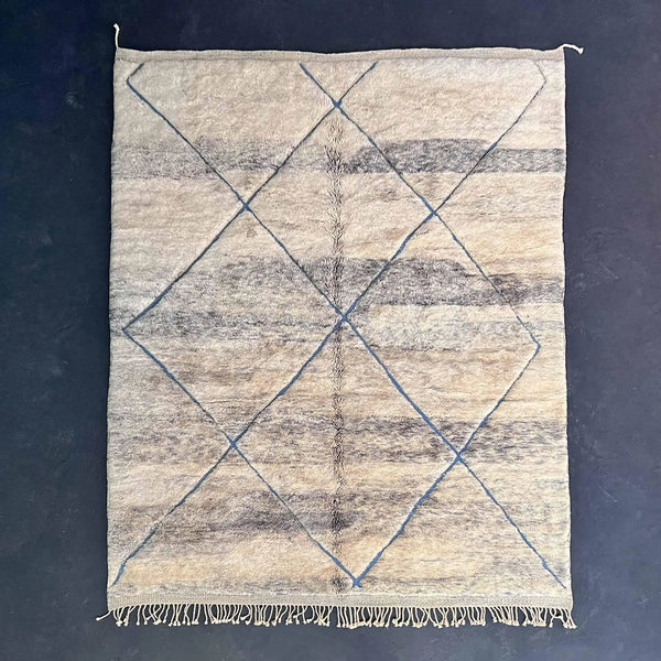 The differences between Beni Ourain rugs and other types of Moroccan textiles, such as kilims or sabra silk. - azilal rug
